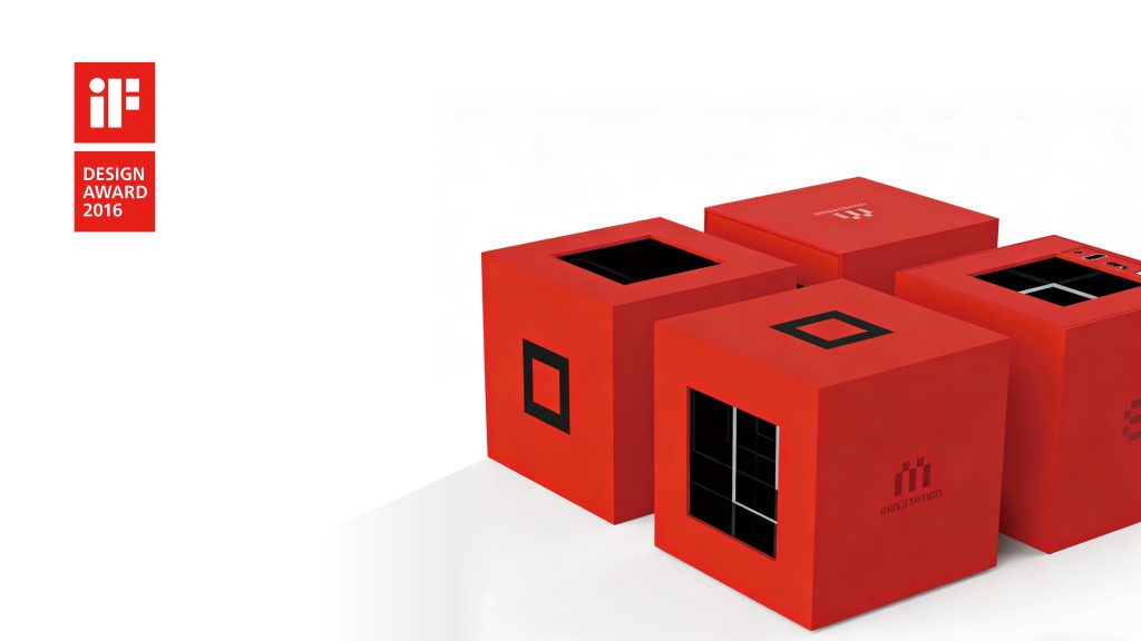 TricubeDesign微游戏机 工业设计案例 ministation 迷你游戏主机产品渲染：深圳市三角立方工业设计有限公司工业设计团队打造的 ministation 微游戏机设计方案，以高饱和红色立方体为核心，融合模块化拼接结构与极简交互设计，纯白背景搭配 iF 设计奖标识呈现产品权威认证与质感，凸显工业设计中潮玩属性与功能实用性的融合价值。