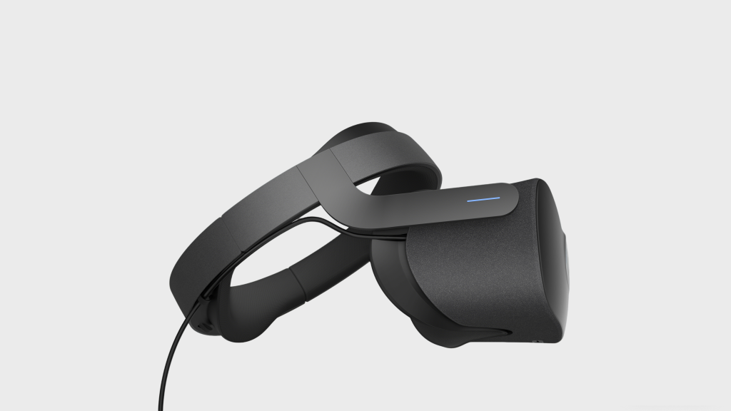 TricubeDesign专业VR眼镜 工业设计案例 头戴式虚拟现实设备产品实拍：深圳市三角立方工业设计有限公司工业设计团队打造的 VR 眼镜设计方案，以轻量化机身为核心，融合人体工学头带与低延迟结构设计，纯色背景呈现产品质感，简约的哑光外壳搭配智能状态指示灯，凸显工业设计中实用性与创新性的融合价值。